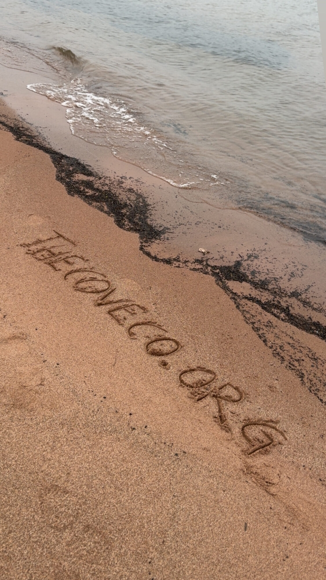 Sand with the words 