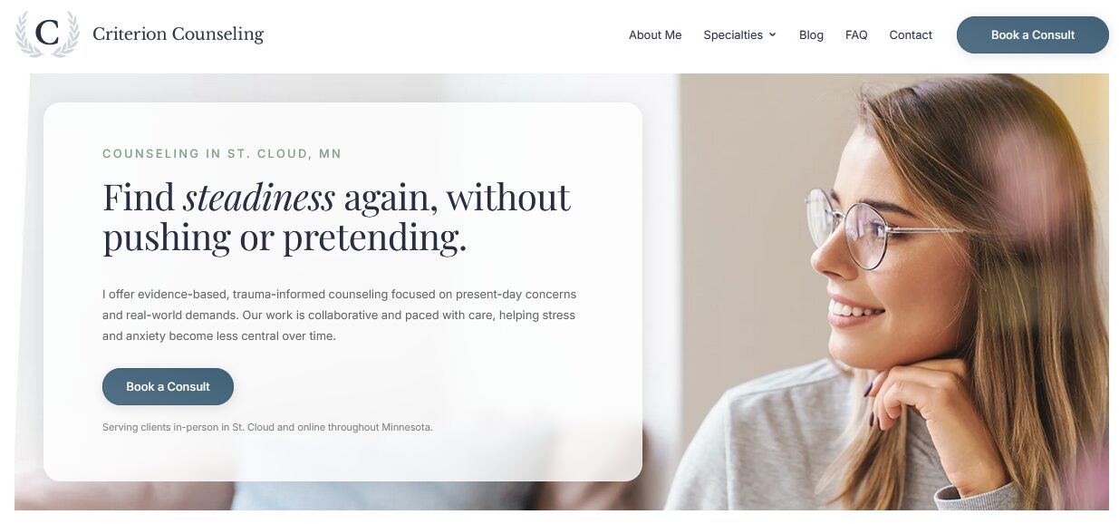 Smiling woman with glasses looking to the right, website header for counseling services, text about finding steadiness, book a consult button.