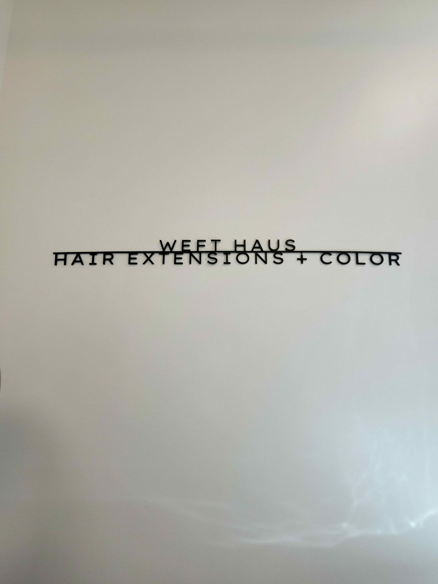 Text on a white surface reads: 'NEWS TILES, HAIR TEXTURES, COLOR'.