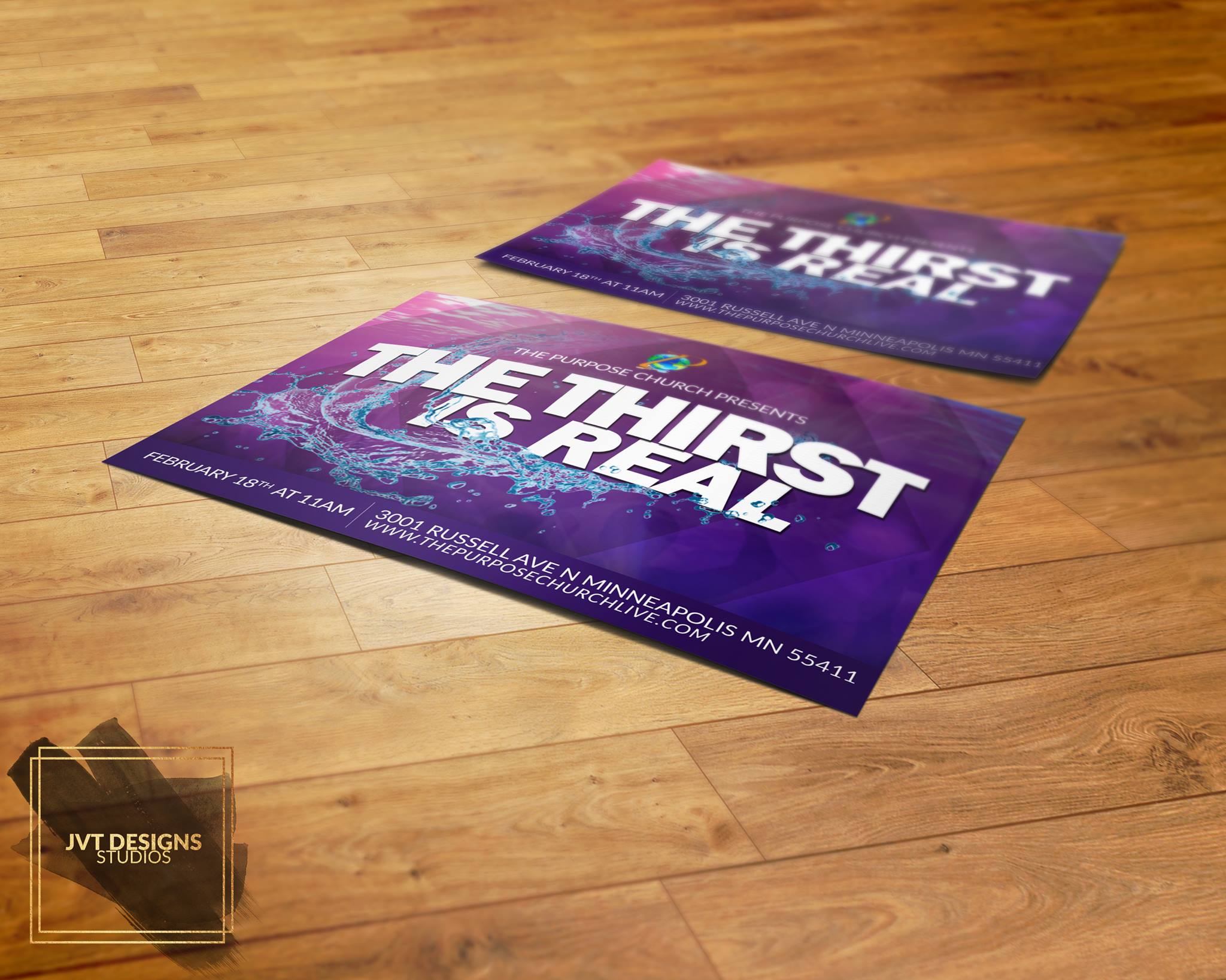 Two flyers on a wooden floor promoting 'The Thirst Is Real' event, with purple and blue graphics and text.