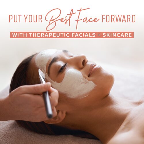 Woman receiving facial treatment with a mask, lying down with eyes closed, in a spa setting.