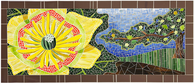 Mosaic mural with a large yellow flower on the left and a landscape with water and trees on the right.