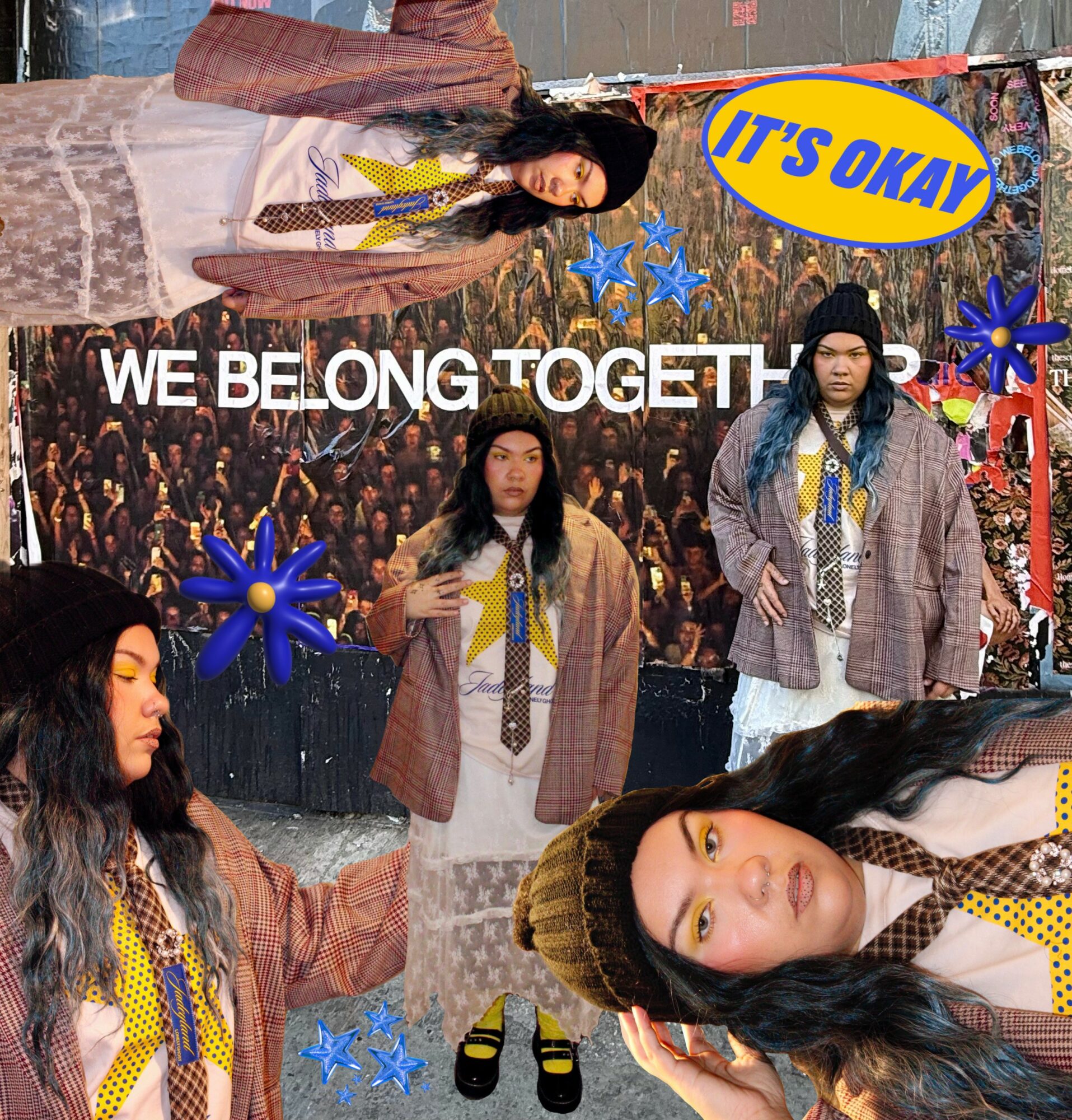 Three young women in coordinated outfits stand in front of a crowd backdrop with text 'WE BELONG TOGETH' and speech bubble 'IT'S OKAY'.