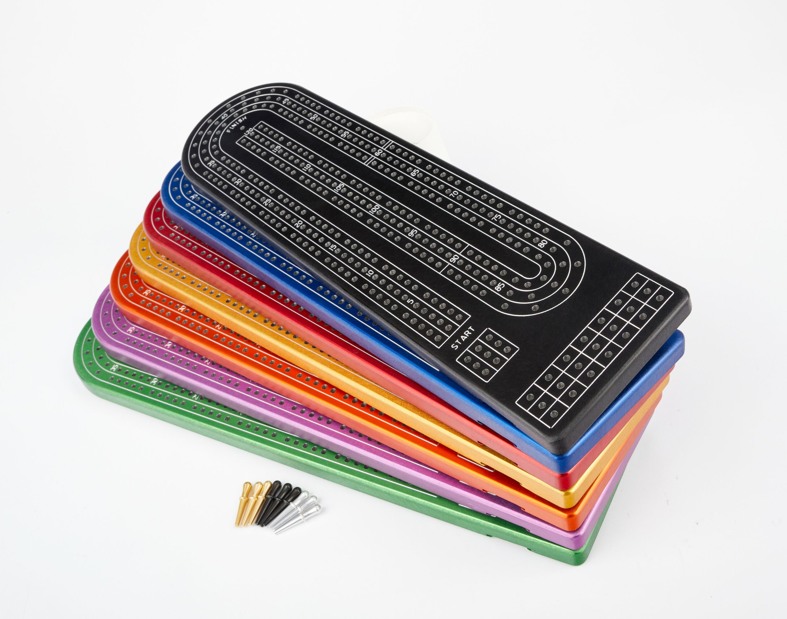 Stack of colorful plastic rulers with black measurement markings, and small black and gold clips, on a white background.