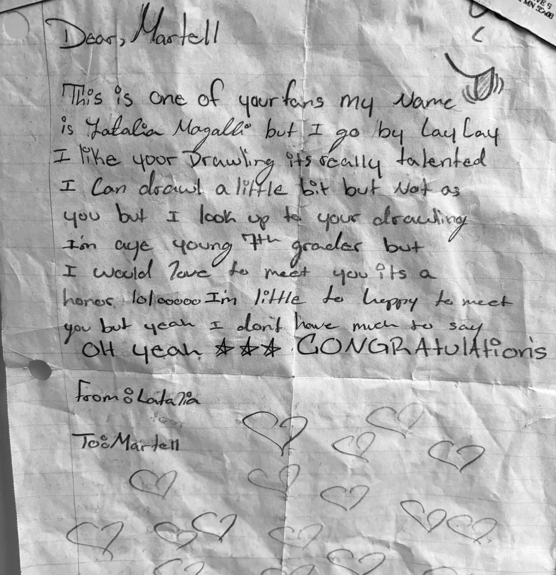 Handwritten note with hearts and a small drawing, expressing congratulations and well wishes, signed by someone named Lala.