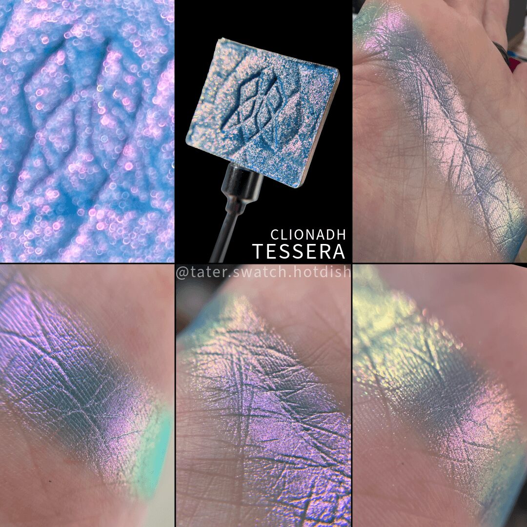 Close-up of iridescent, cracked makeup swatches on skin with holographic effects, and a glittery makeup product in the center.