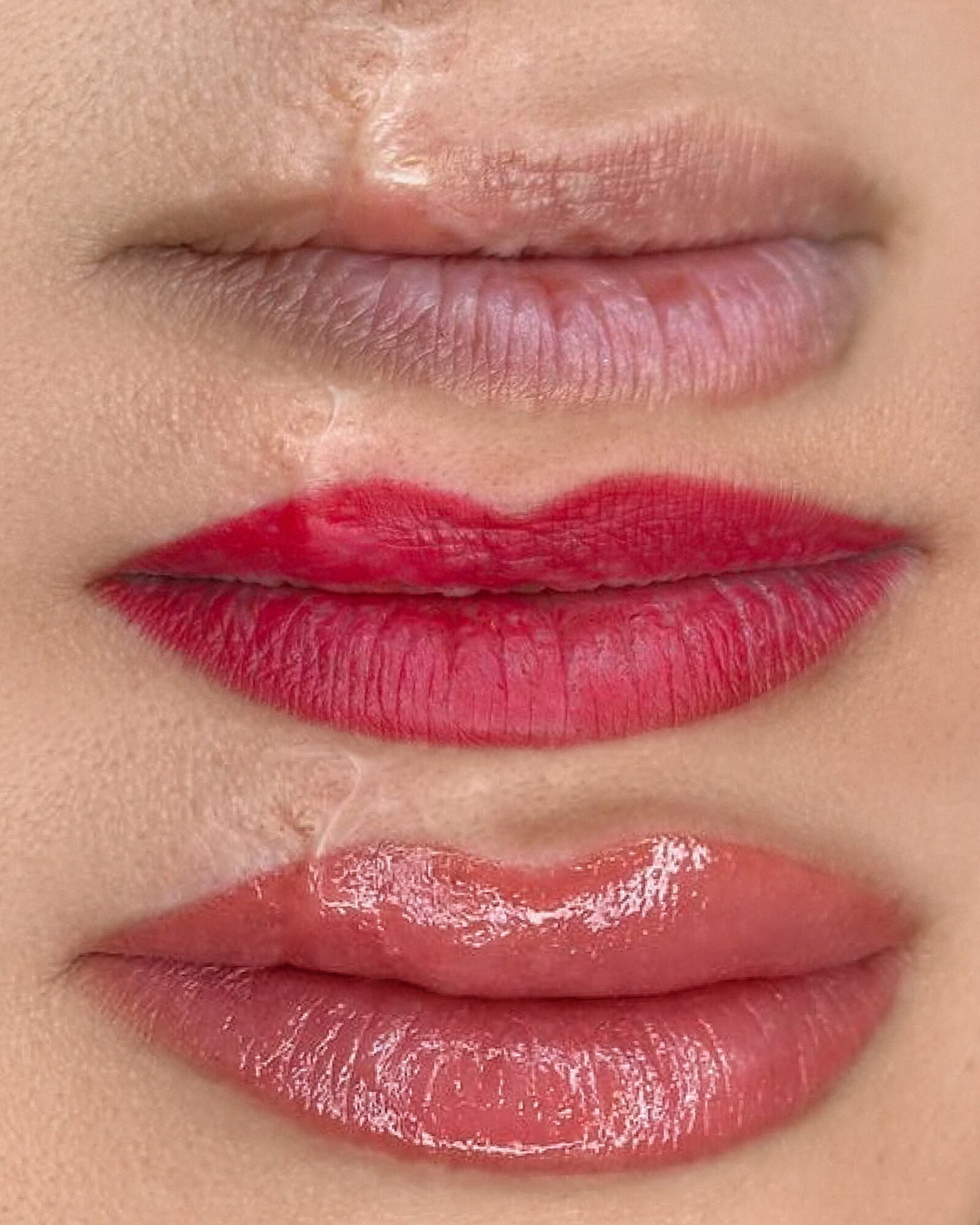 Close-up of lips with pink lipstick, slightly parted, showing natural lip texture and gloss.
