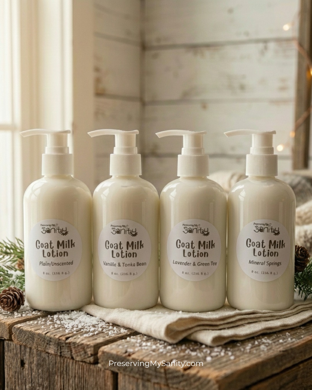 Four bottles of coat milk lotion with pump dispensers on a rustic wooden surface, background of white wooden wall, natural light.