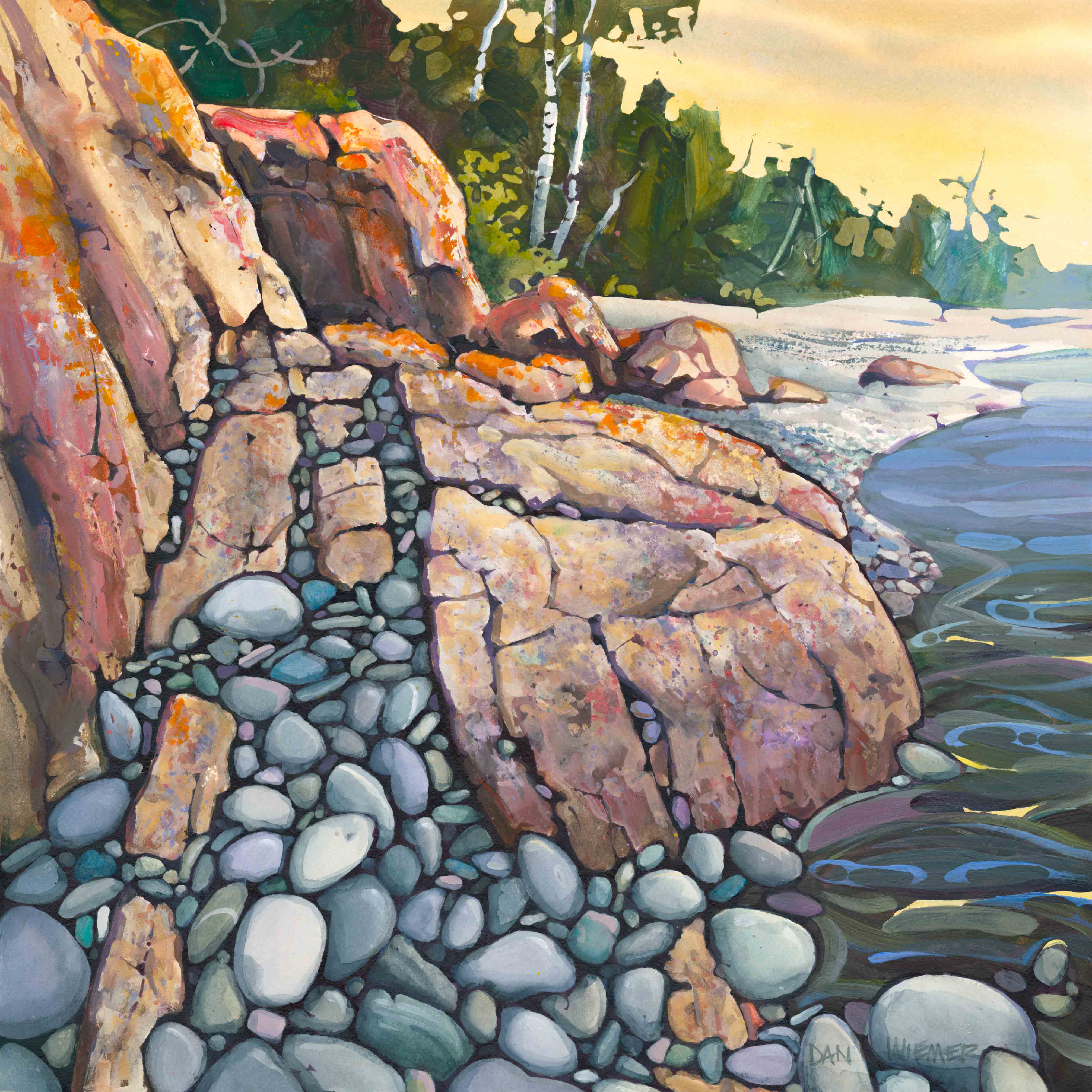 Rocky shoreline with large rocks and pebbles, trees in background, water flowing along the coast, sunset sky.
