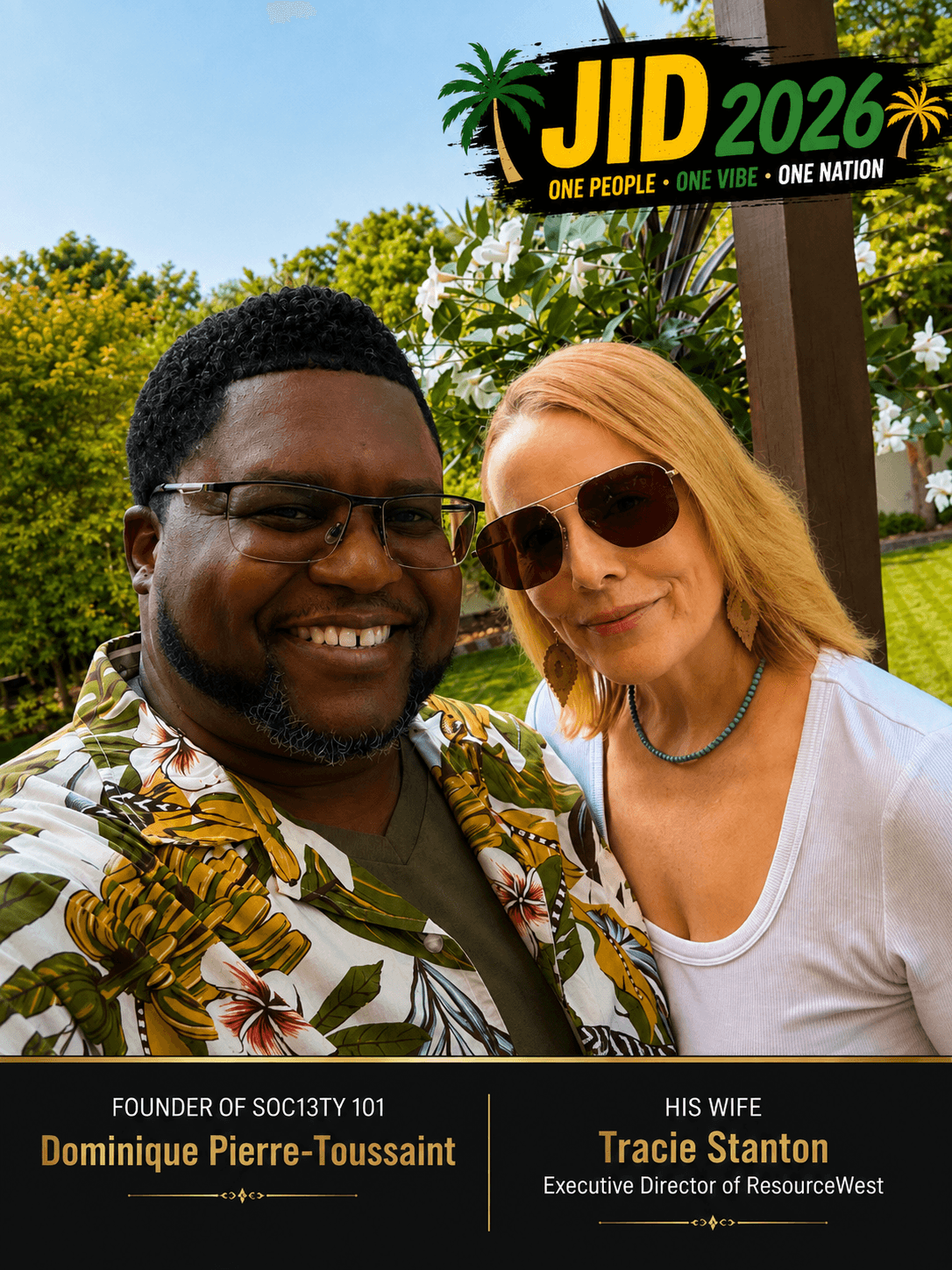 Two people smiling outdoors, one wearing sunglasses and a floral shirt, the other in a white top, with a sign in the background.