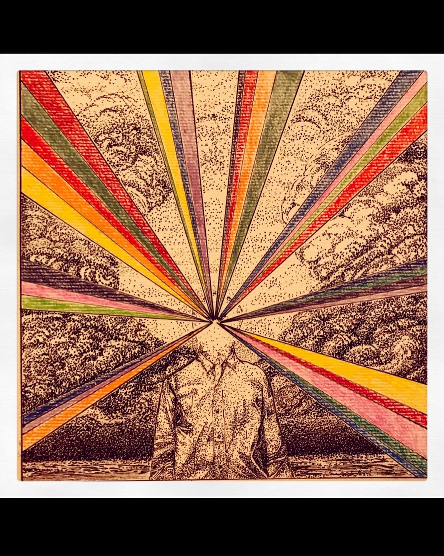 A person stands in front of a colorful, radiating pattern with lines extending outward from the center.